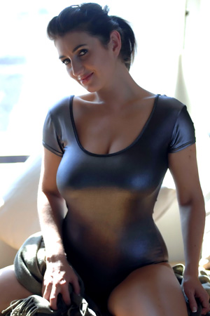 Tibby Muldoon in 'Silver Bodysuit' via Girlfolio